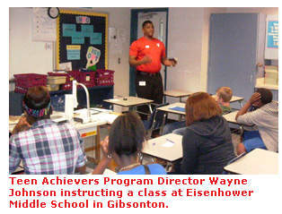 Teen Achievers Program Director Wayne Johnson instructing a class at Eisenhower Middle School in Gibsonton.